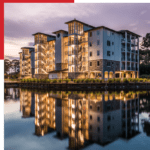 An image of a building with a reflection in the water.